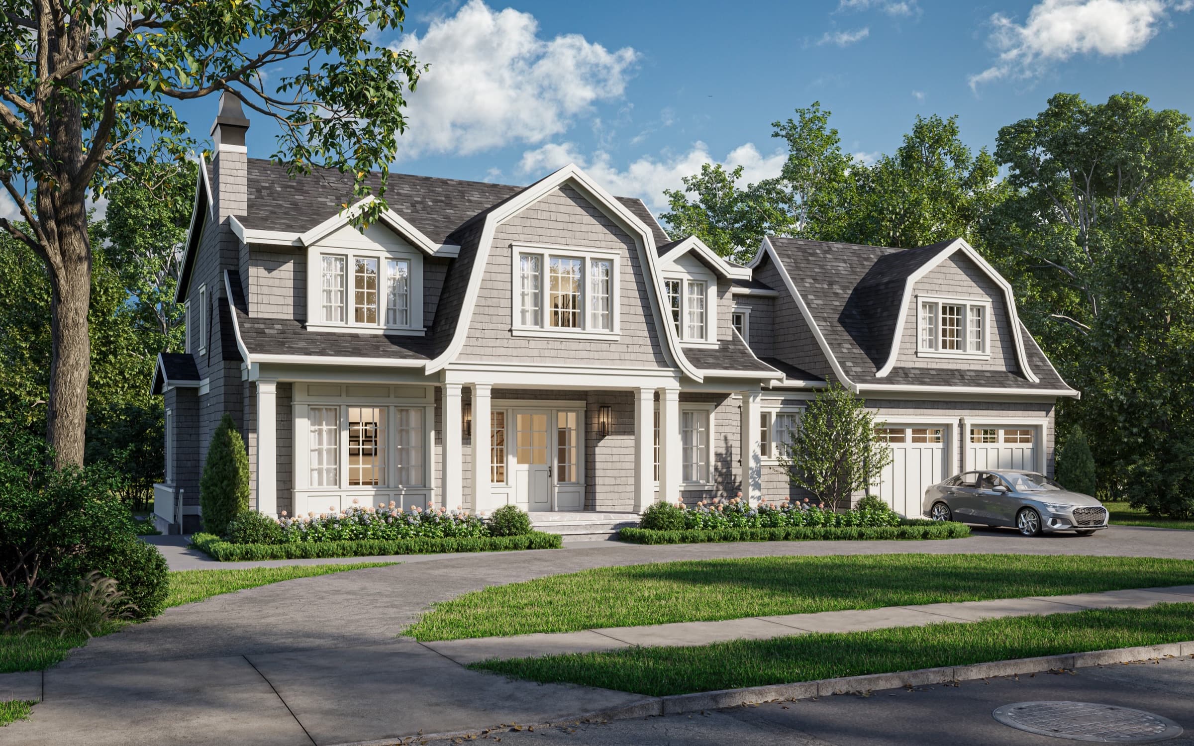 Front of a gray shingle-style new-construction home in Kennebunk, Maine